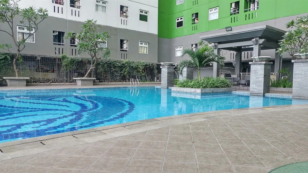 Comfy And Homey 2Br At Green Pramuka City Apartment