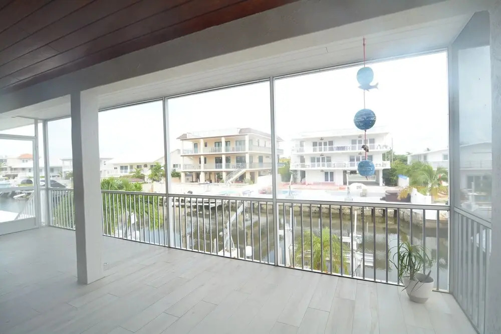 Beautiful Canal Front Home With Above Ground Pool, Dock And Fish Cleaning Station 4 Bedroom Home by RedAwning