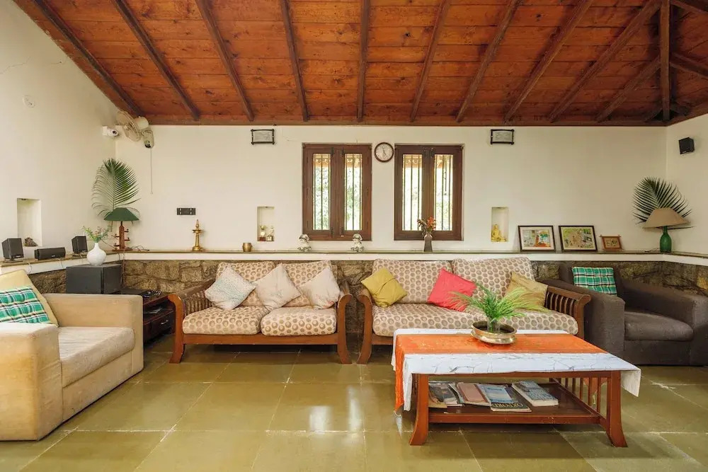 Kerala Style Villa by JadeCapsAC4BHKFishpond