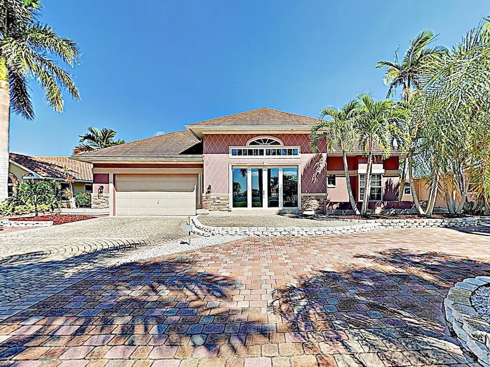 New Listing! European-style On Canal W/ Pool 4 Bedroom Home
