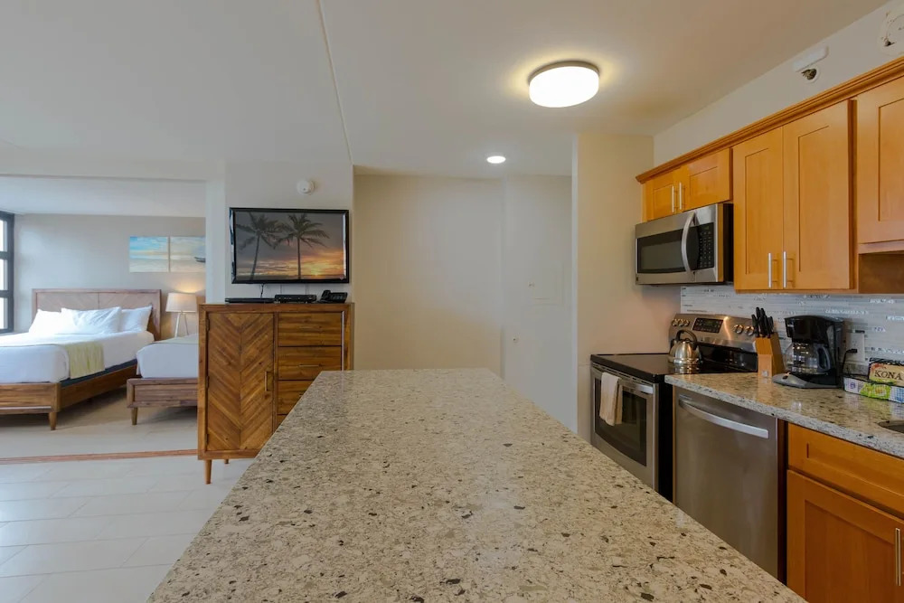 Waikiki Banyan High Level Condo with Ocean Views from the Private Lanai