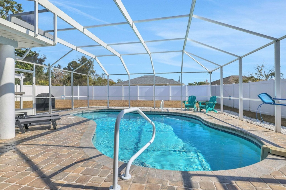 Contemporary Coastal Escape With Heated Pool, Fenced Yard, & Outdoor Dining