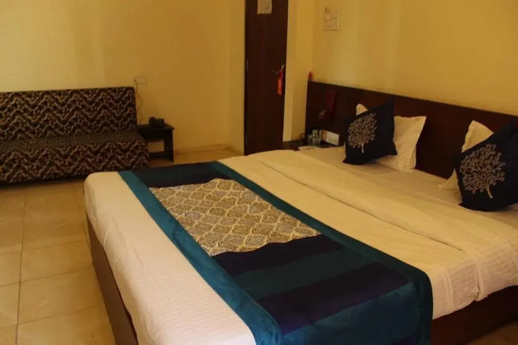 Hotel Om by FabHotels