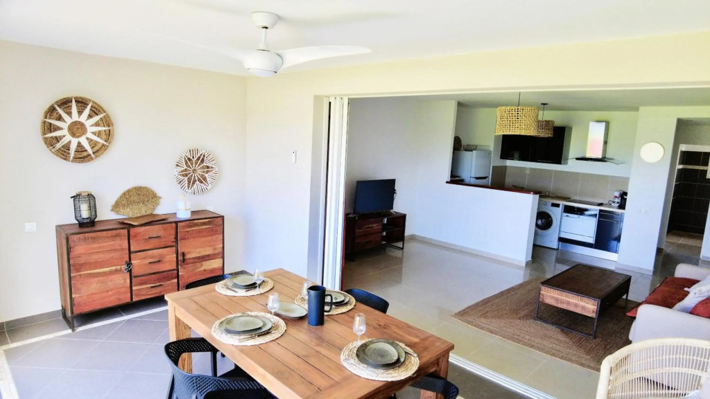 Le Baileys - Spacieux appartement en rez-de-jardin vue lagon