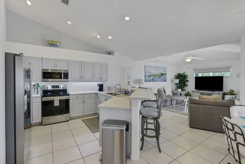 Contemporary Coastal Escape With Heated Pool, Fenced Yard, & Outdoor Dining