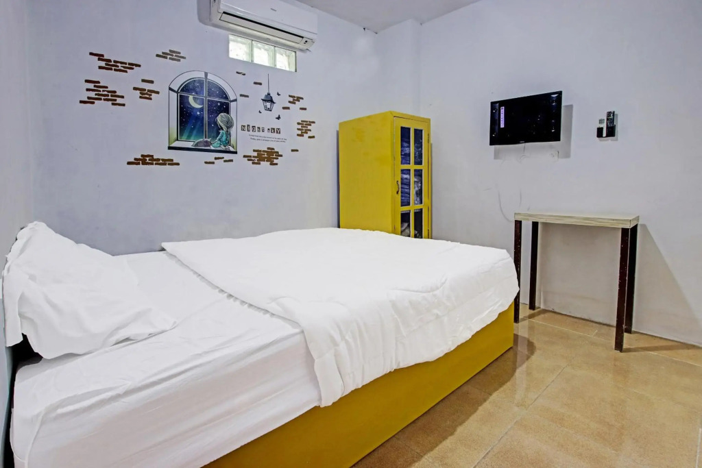 SPOT ON 91506 Guest House Putri Raja