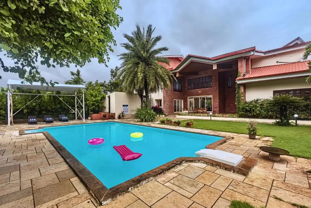 SaffronStays Ananya, Karjat - pet-friendly pool villa with a party deck and games