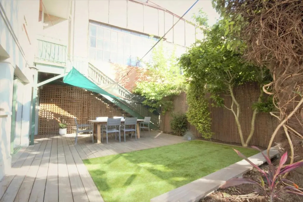 Gd appt T5 avec bureau jardin et parking en centre ville