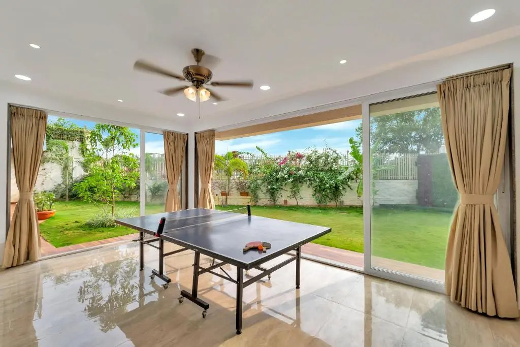SaffronStays Juniper, Lonavala - Pet-friendly villa with pool, lawn, gym & games