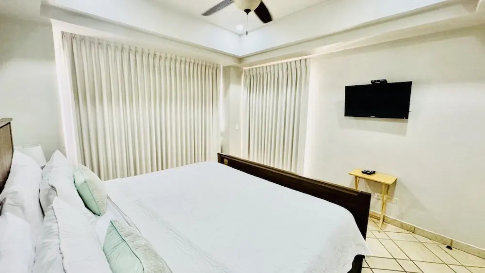 Spectacular 1 1/2 Bedroom Condo on Sandy Beach at Las Palmas Beachfront Resort 1 Condo by RedAwning