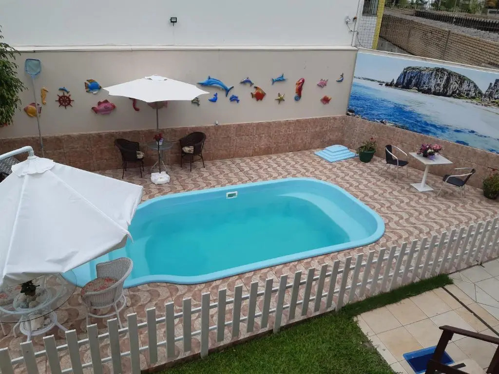 Apartamento com Cozinha Completa em Torres, Perto das 4 Praças e praia