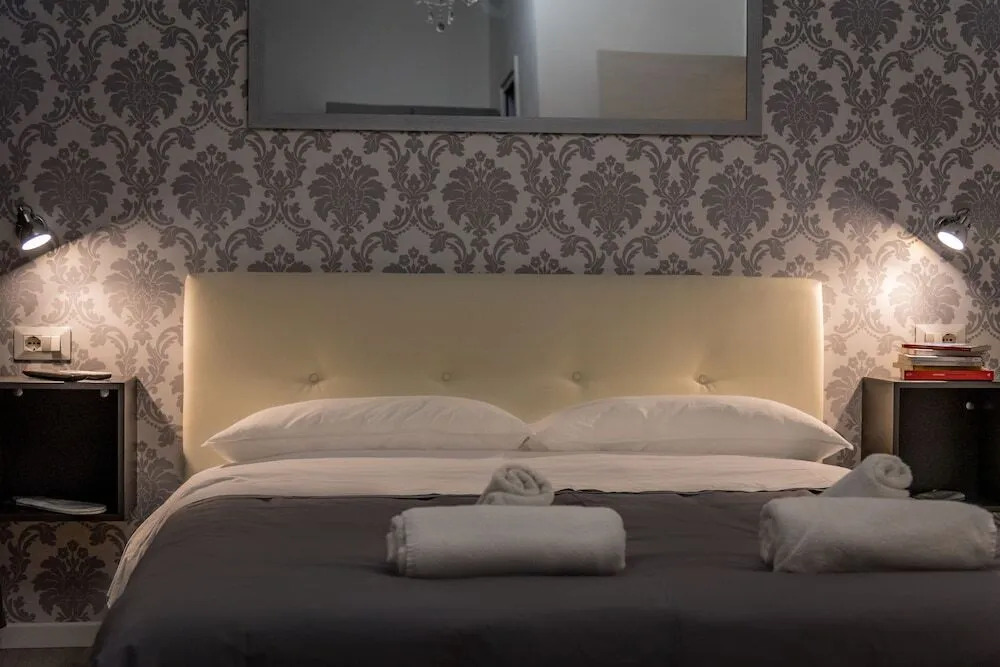 Inside Roma Rooms by DOT Suites