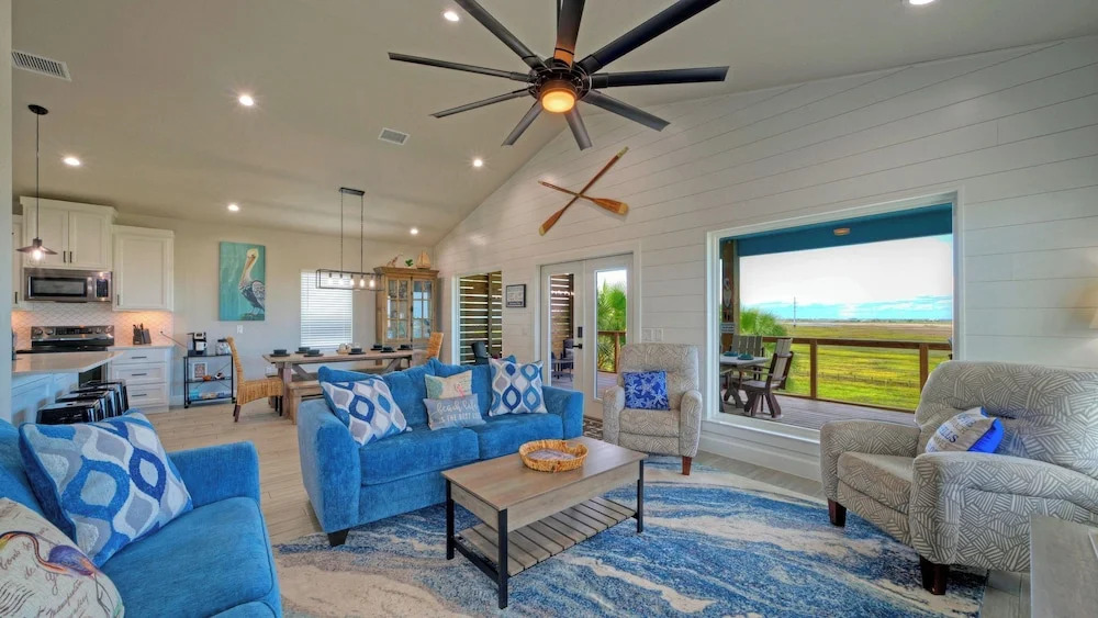 Bayfront Home w/ Pool, Game Room + Walk to Beach & Golf Cart Access Pelicans Perch by Avantstay