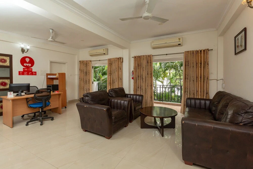 Cute Orange Service Apartments By OYO Rooms