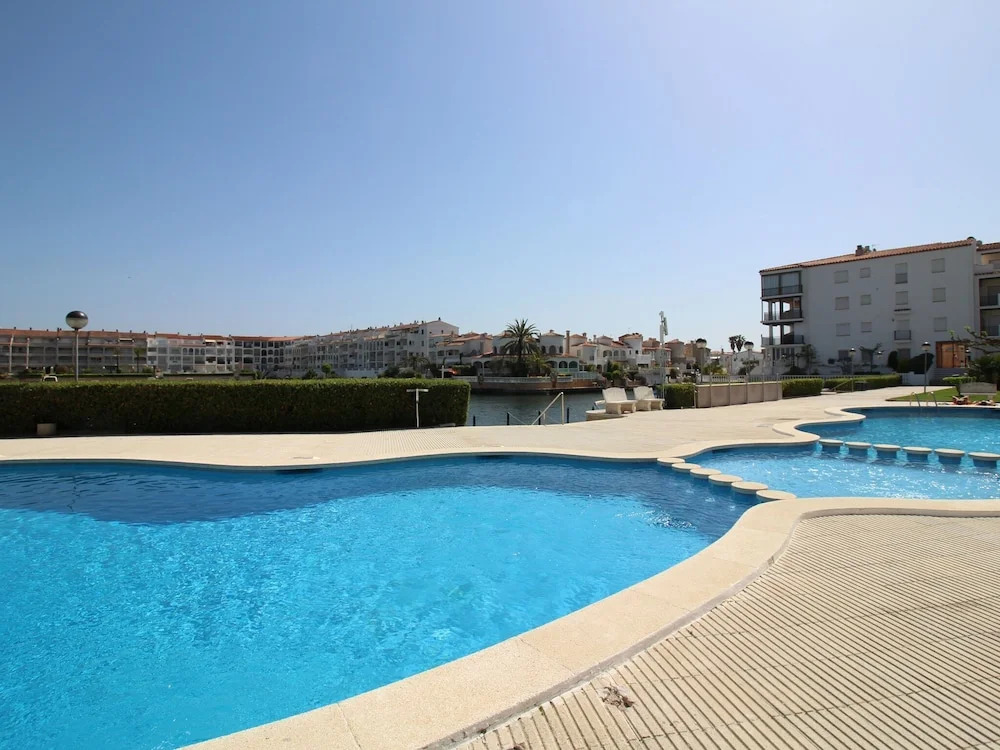 Apartment With a View of the Canal and the Communal Pool