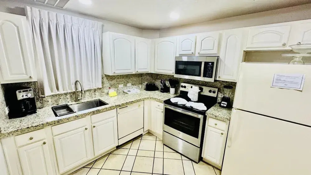 Spectacular 1 1/2 Bedroom Condo on Sandy Beach at Las Palmas Beachfront Resort 1 Condo by RedAwning