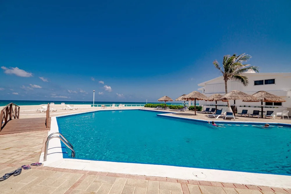Private pool in beach front Villa