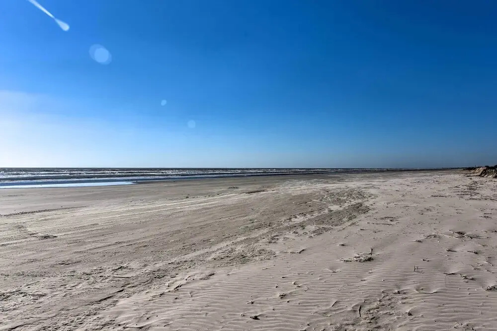 Wake Up to Waves Oceanfront Surfside Home