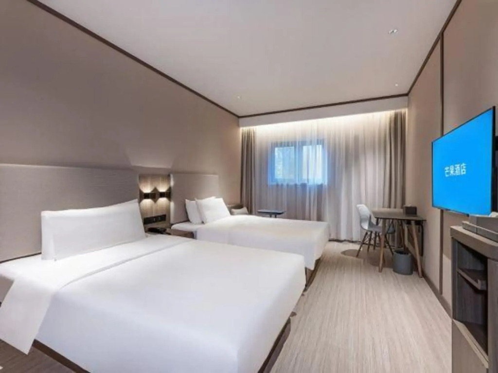 Mango Hotel (Nanjing Hexi Wanda Mochouhu Subway Station)