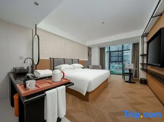 Hechi Rezen Trend Hotel (Jinchengjiang Station Baima Pedestrian Street Branch)