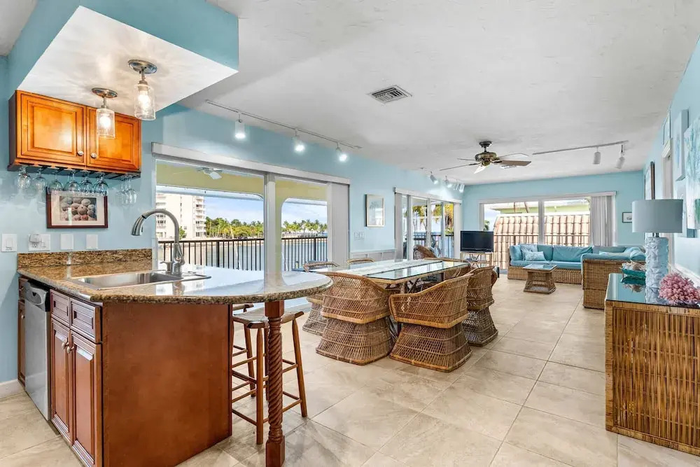 Sunset Harbor Waterfront Villa with Dock Cabana Club