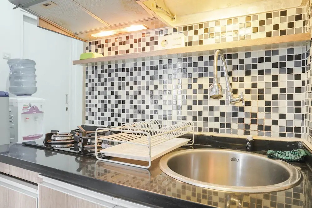 Cozy Stay at 2BR Green Pramuka Apartment near Shopping Center