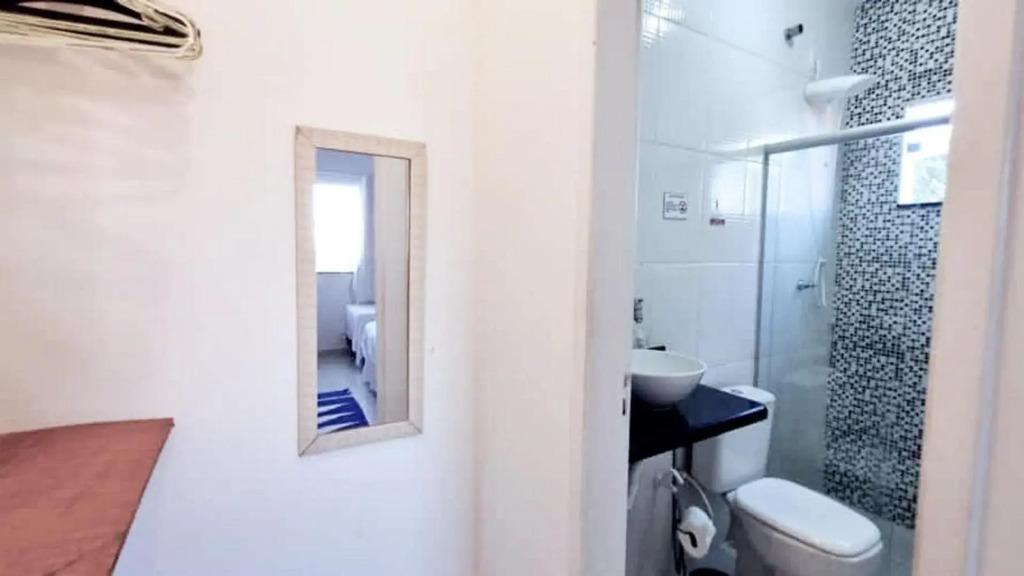 Casa de 4 suítes com piscina e área gourmet em Porto Seguro - Casa dos Ipês