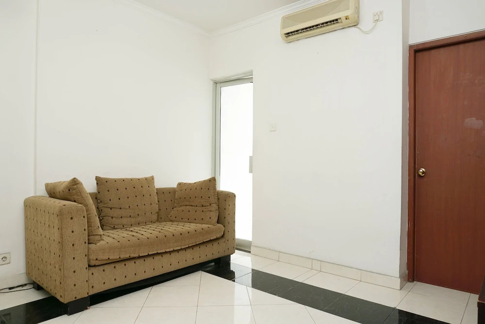 Classic and Warm 2BR Gading Mediterania Apartment