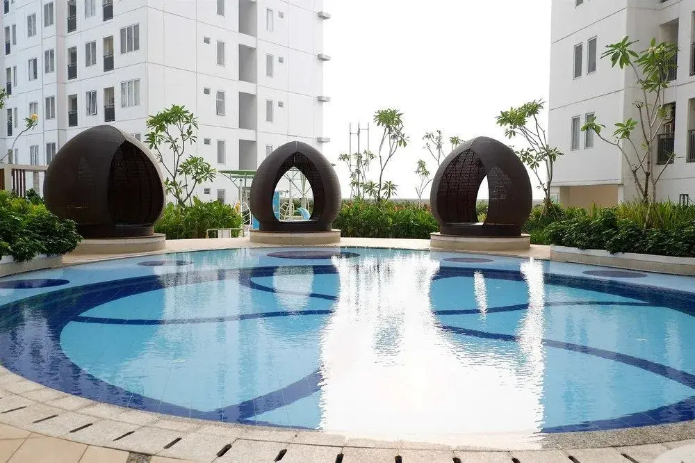 2 Bedrooms at Bassura City Apartment with Mall Access By Travelio