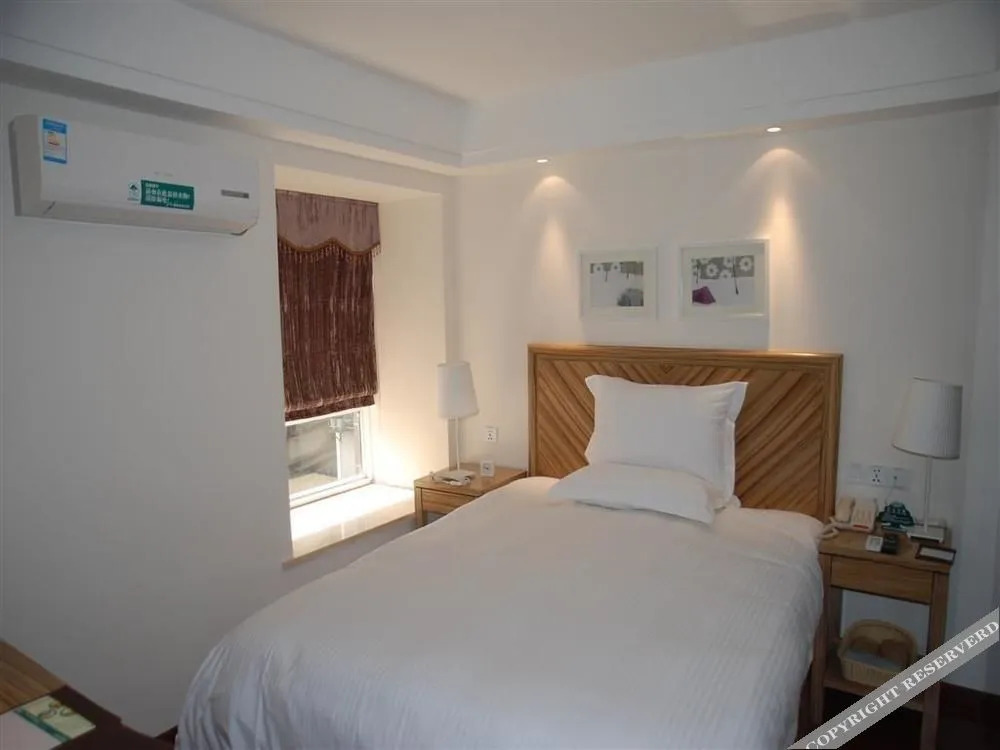 Green Tree Inn - Jiujiang Baibaoli