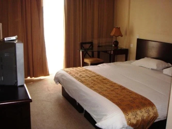Baolong Homelike Hotel (Luojing Branch)