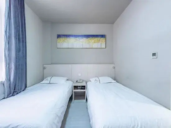 Linyi Mengnuo Hotel (University City bus station store)