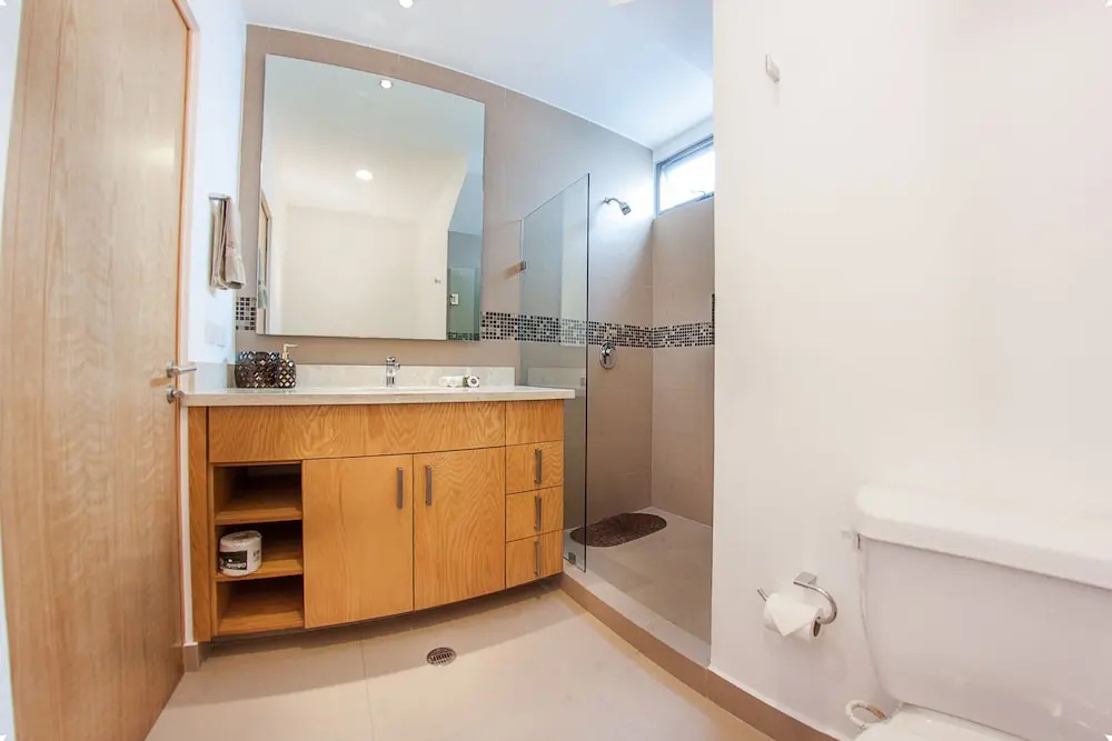 Fun and Relaxing  2BR PH steps away from the beach by Happy Address