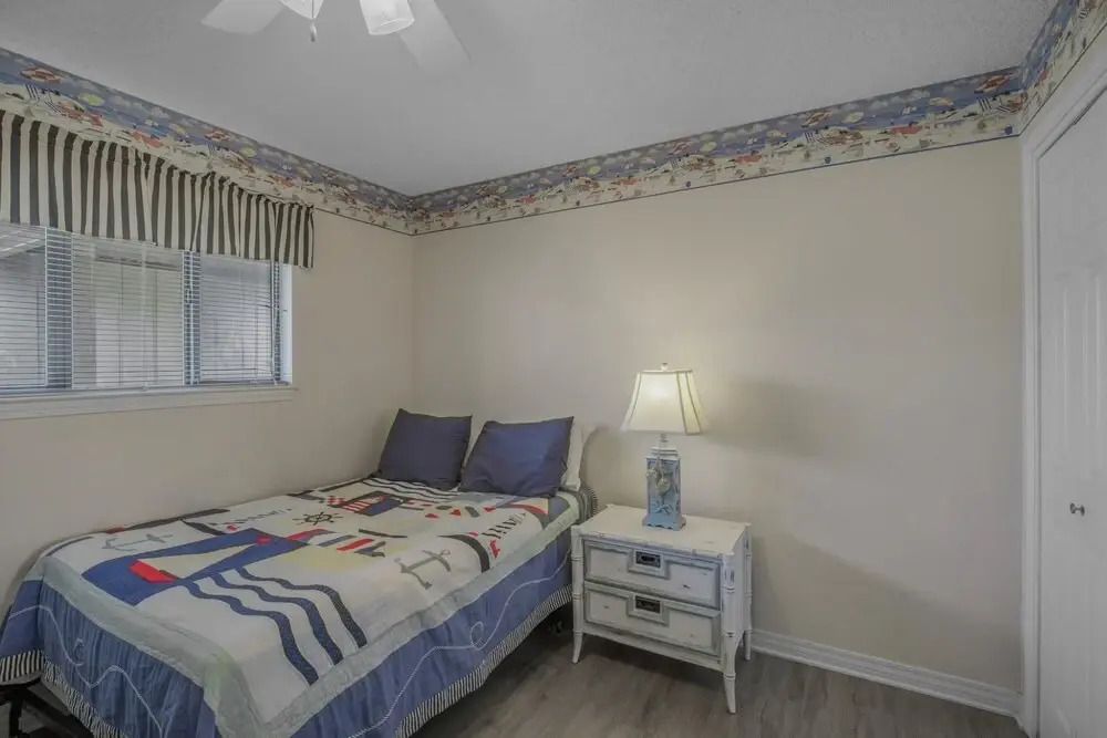 Pleasant Condo With Pool and Walk to Beach