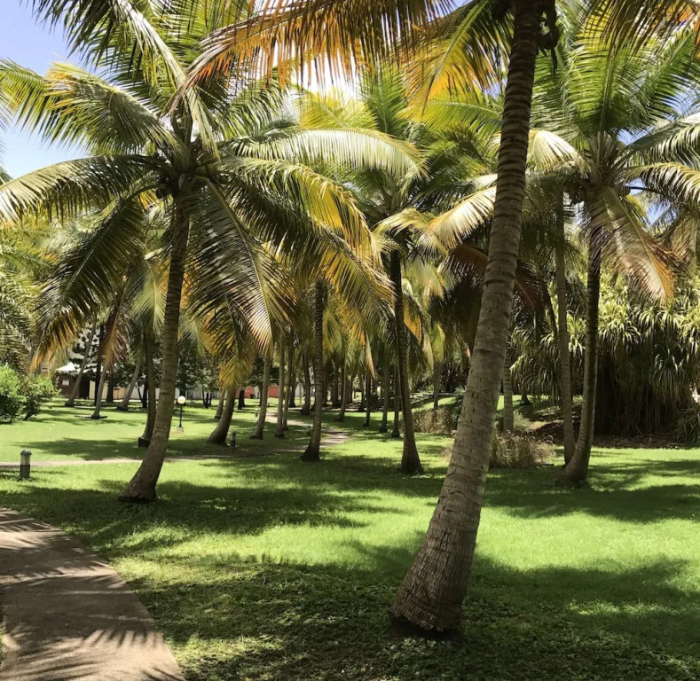 Ti. Maanga vue mer et pieds dans l'eau