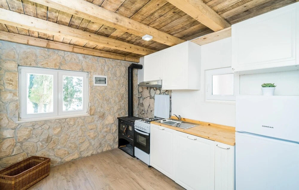 Amazing Home in Gruda With Outdoor Swimming Pool, Wifi and 2 Bedrooms