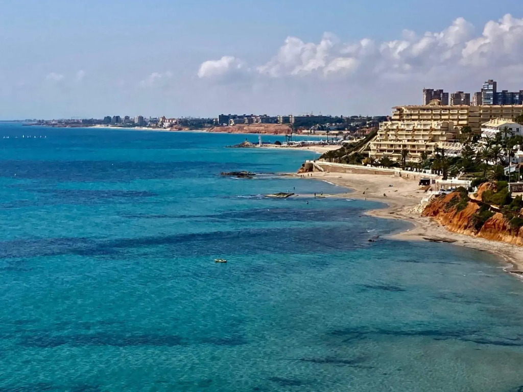 Beautiful location in Cabo Roig Orihuela-Costa at Playamarina II with a private roof terrace and two balconies