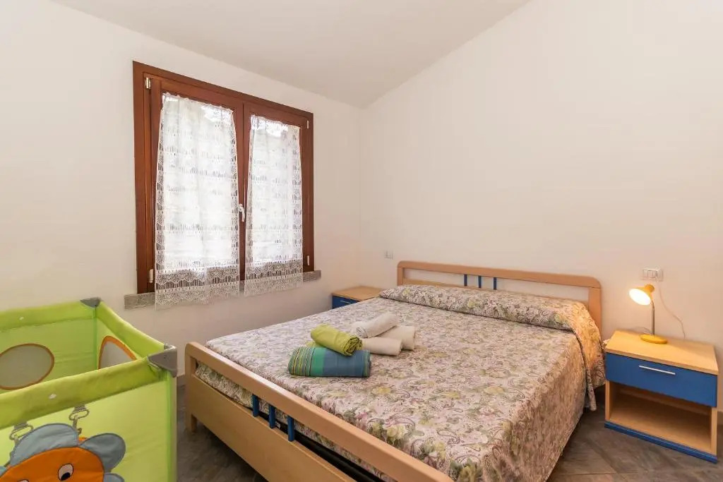 Appartamento con piscina 14