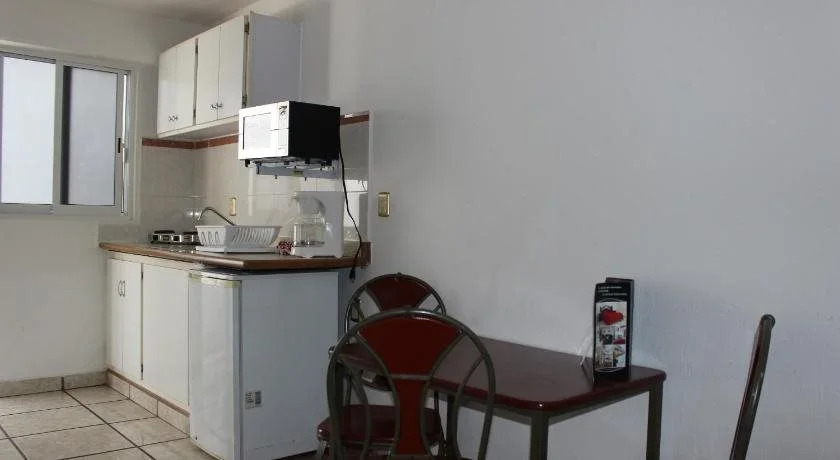 Capital O Hotel Suites Andrade