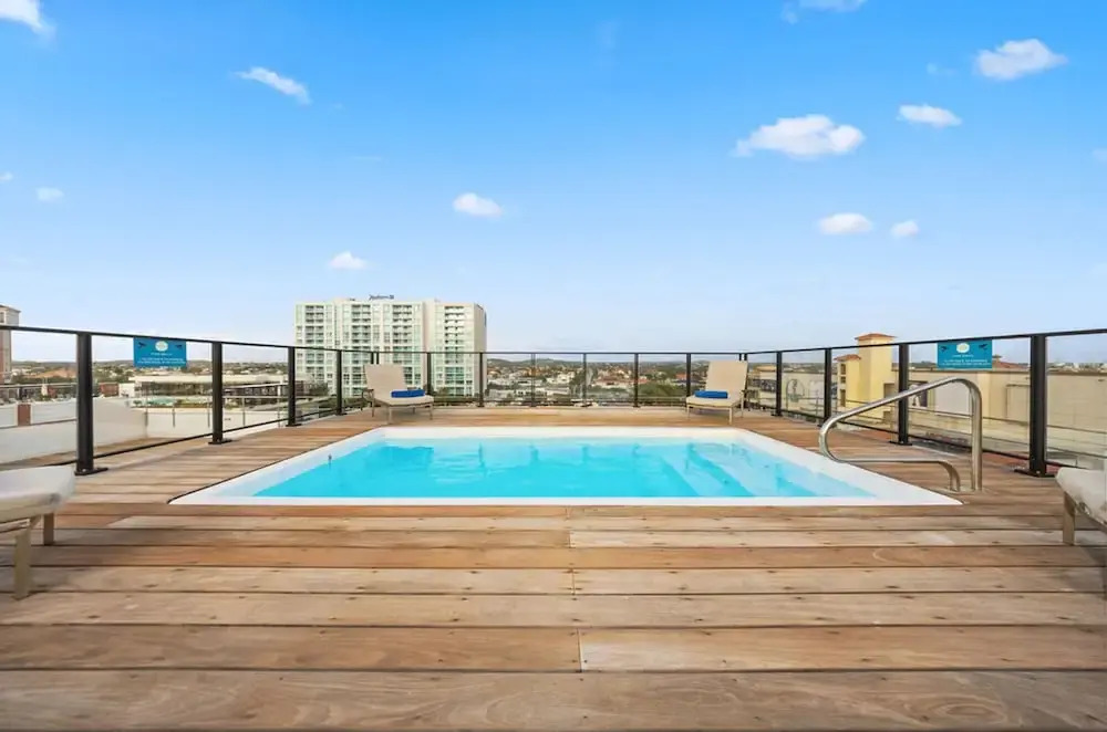Modern Corner Unit Pool Steps From Palm Beach