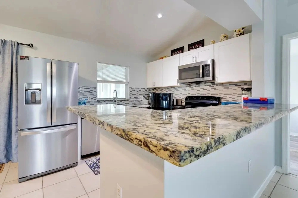 Fenced Yard & Game Room: Family Home in Kissimmee