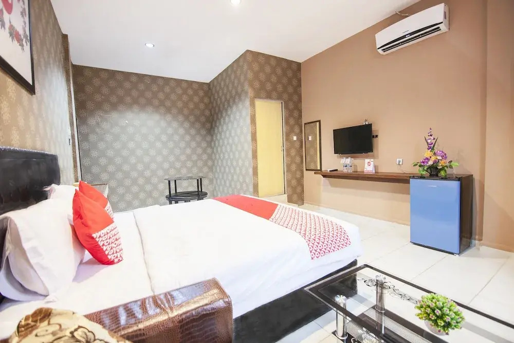 Coin Mulia Hotel By OYO Rooms