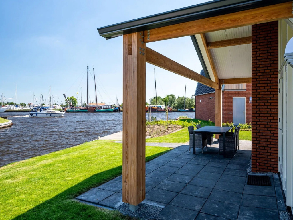 Disabled house on the water, on a holiday park in Friesland