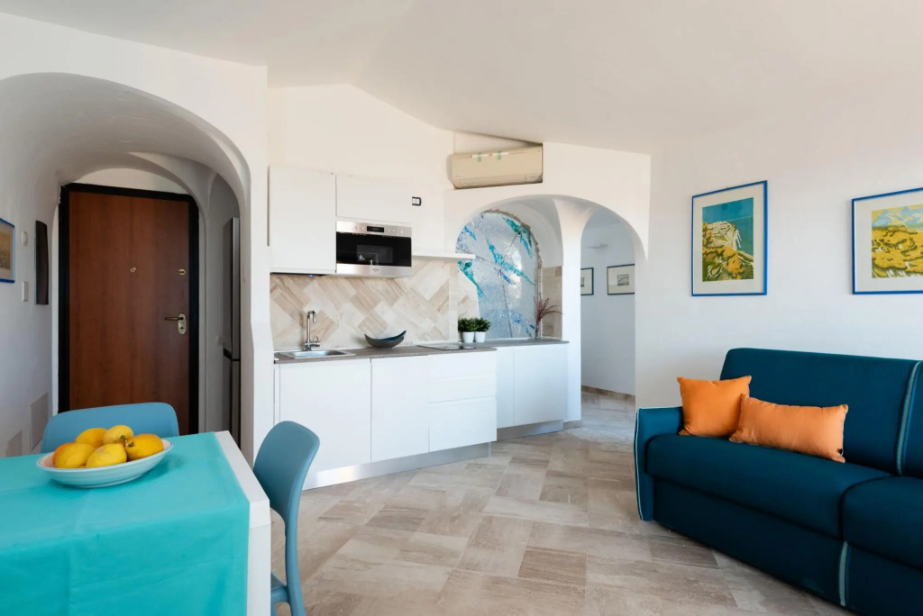 it has 1 bedroom communicating with living room with sofa bed, kitchen, large terrace (with table an-SHERDEN BILO 8