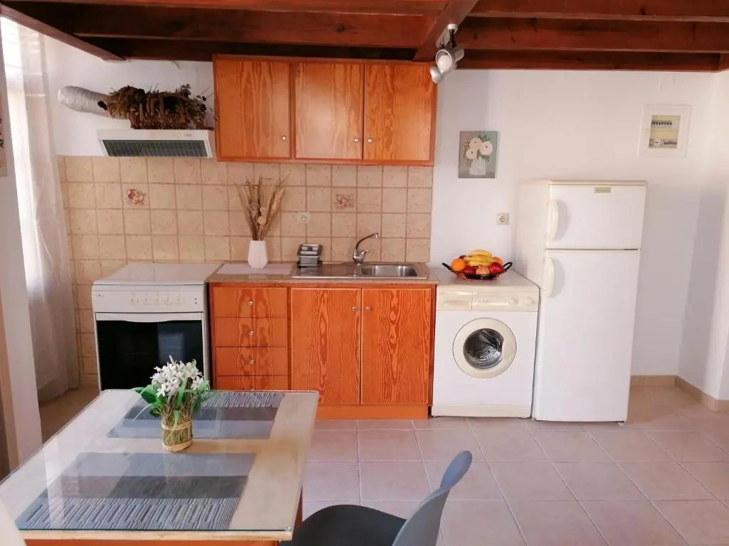 THEOS APARTMENTS