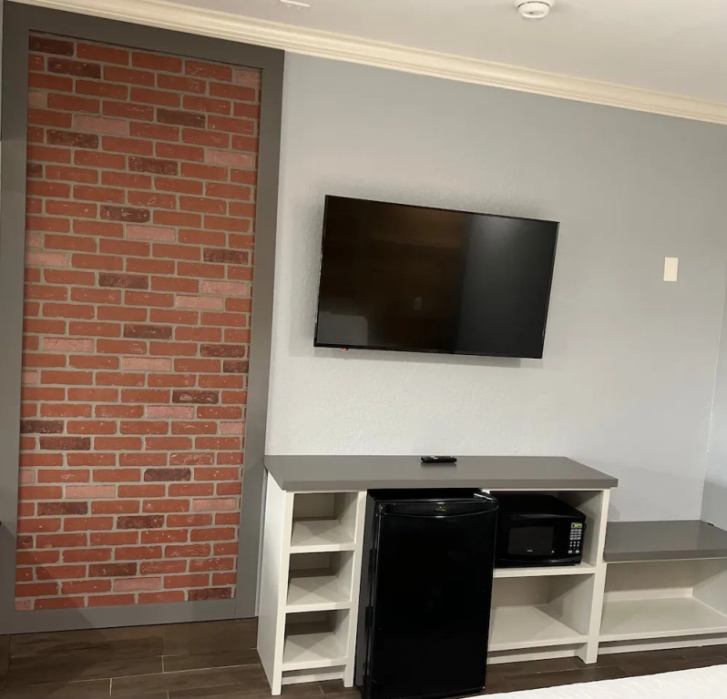 The Symphony Inn & Suites