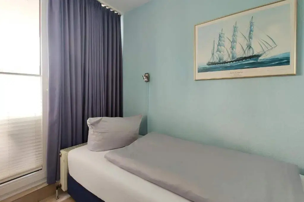 Strandnahe-Ferienwohnung-102-mit-Westbalkon-Haus-Hohe-Worth-Duhnen