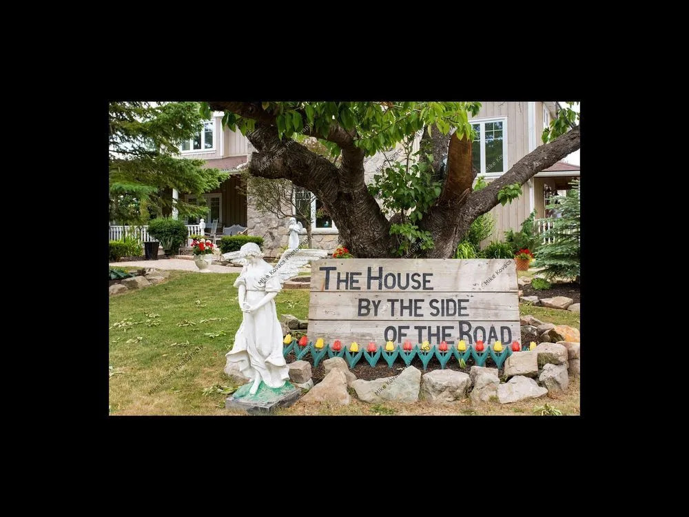House by the Side of the Road