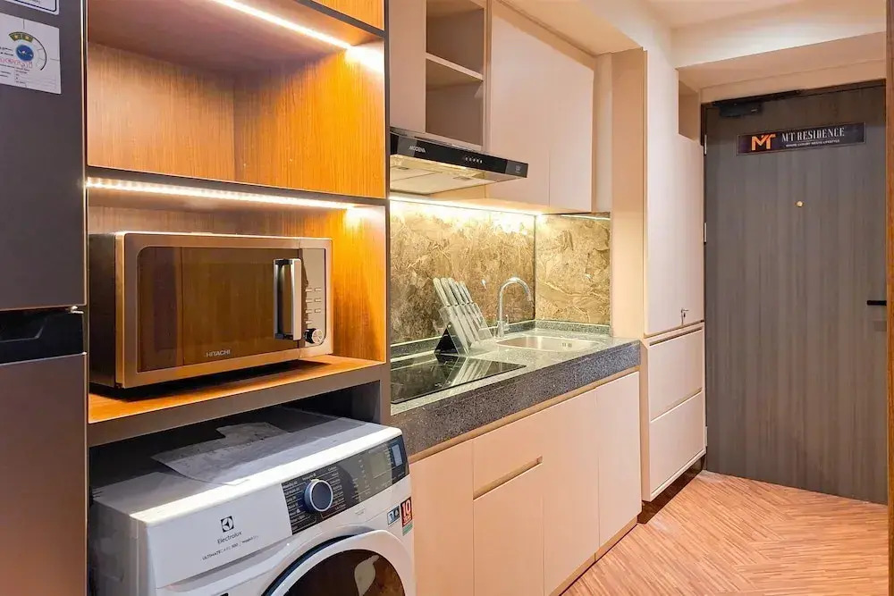 Modern Rustic Studio Apartment At Carstensz Residence
