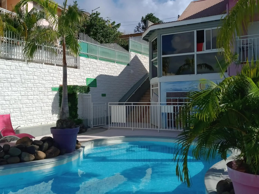 Appartement de 2 chambres avec piscine partagee jardin clos et wifi a Sainte Anne a 3 km de la plage